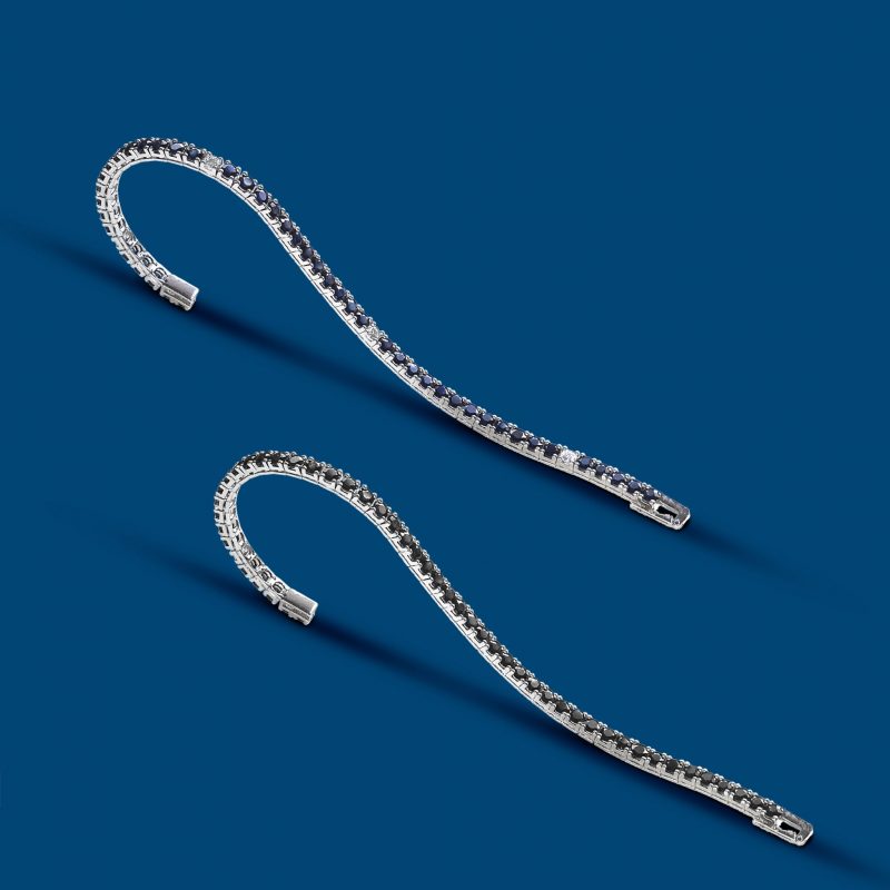 br6317ptz • cm 20 - Platino 950‰ g. 24.00 • Diamanti ct. 0.50 • Zaffiri ct. 11.00 - € 7.800br6317ptdn • cm 20 - Platino 950‰ g. 24.00 • Diamanti Neri ct. 9.00 - € 6.800